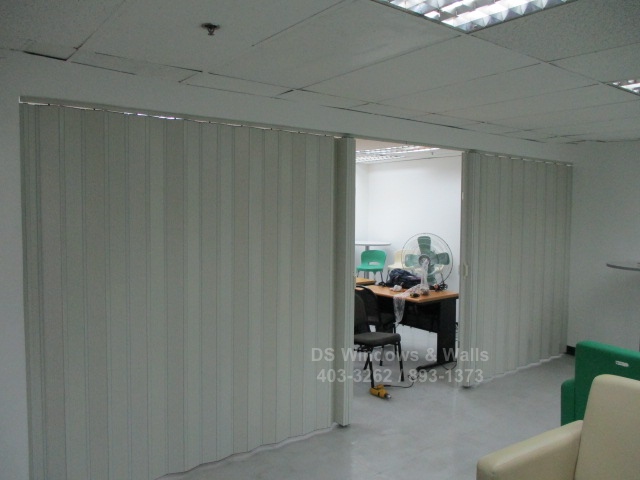 Dividing large office into two using folding doors