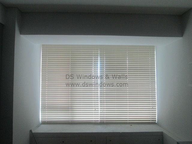 Faux Wood Blinds Installed In The Bedroom