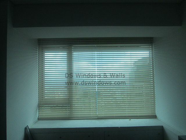Faux Wood Blinds Installed In The Bedroom