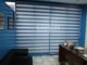 Blue combi blinds with color coordinated valence